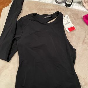 Assymetrical sleeved bodysuit